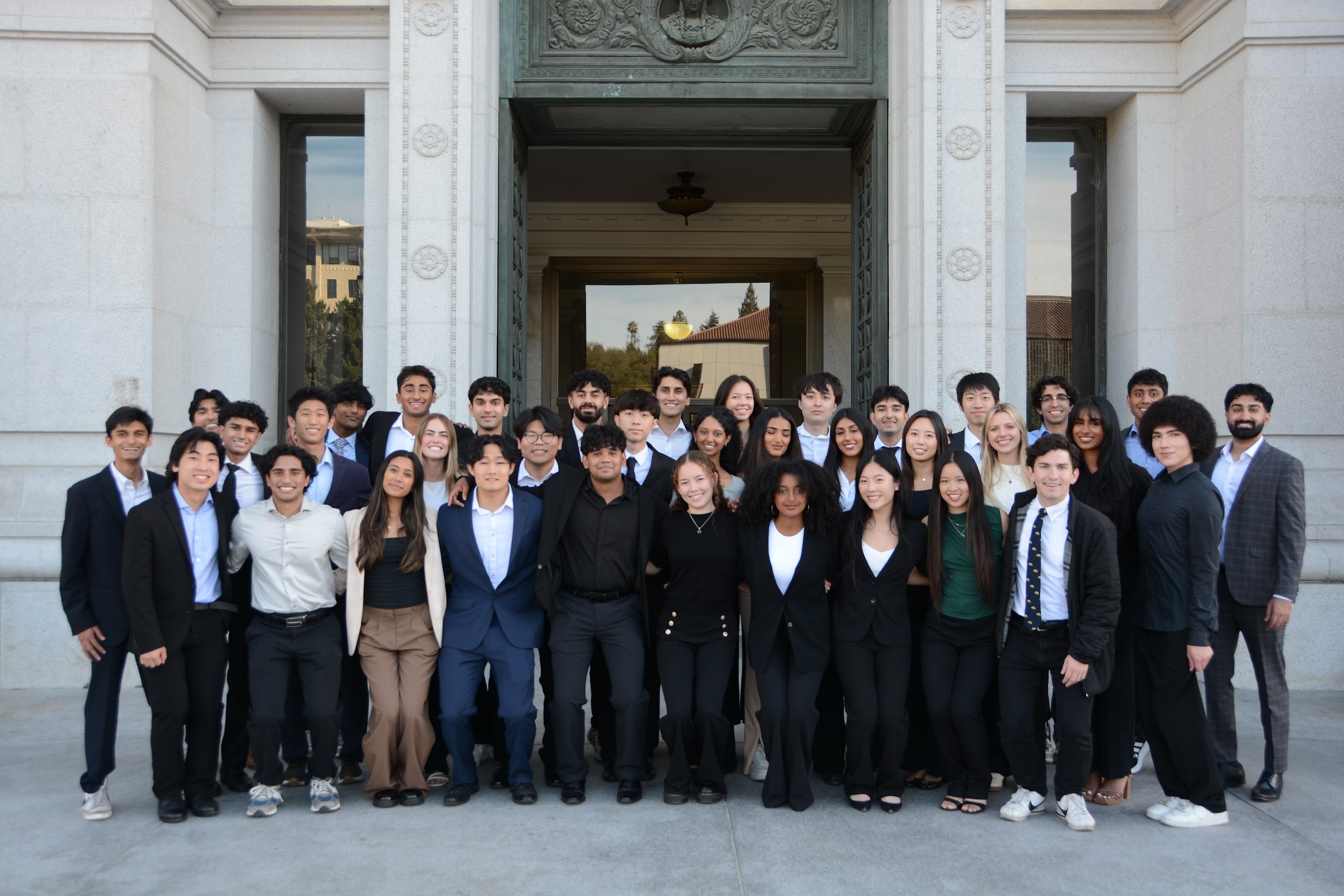DataStory team in business attire - How We Grow