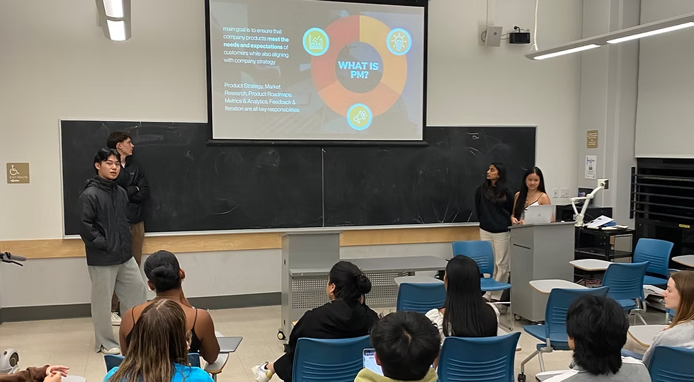 Workshop classroom scene with students and presentation